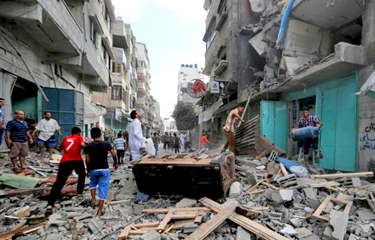 Palestinians inspect